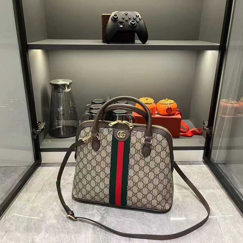 G*u*i top handle bags